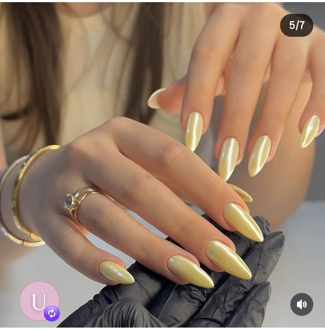 Golden chrome almond nails