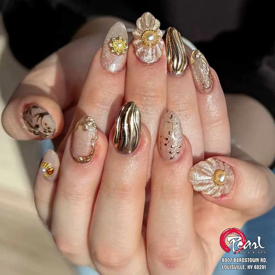 Gold embellished nail art — from Pearl’s original gallery