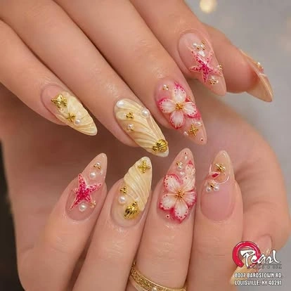 Pink and yellow floral nail art created at Pearl