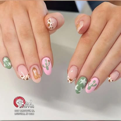 Pastel French tips with flower details at Pearl Nails ’n Spa