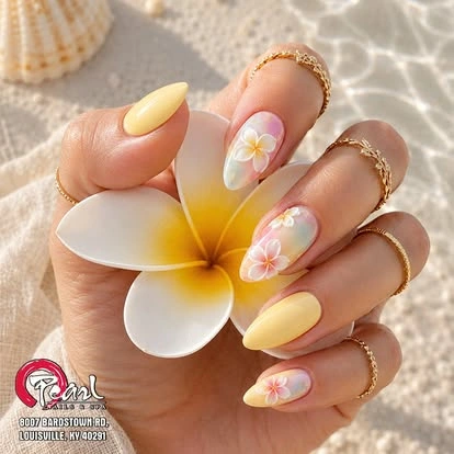Yellow floral manicure at Pearl Nails ’n Spa
