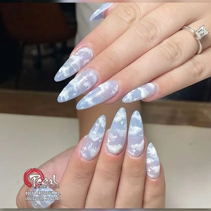 Iridescent blue cat eye nail extensions at Pearl Nails ’n Spa