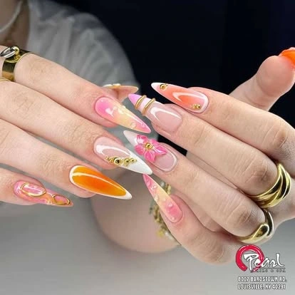 Bright pink and orange nail art at Pearl Nails ’n Spa